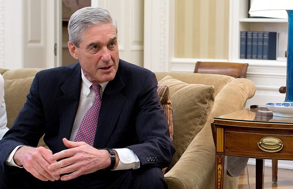 Robert Mueller sits in President Obama's Oval Office.